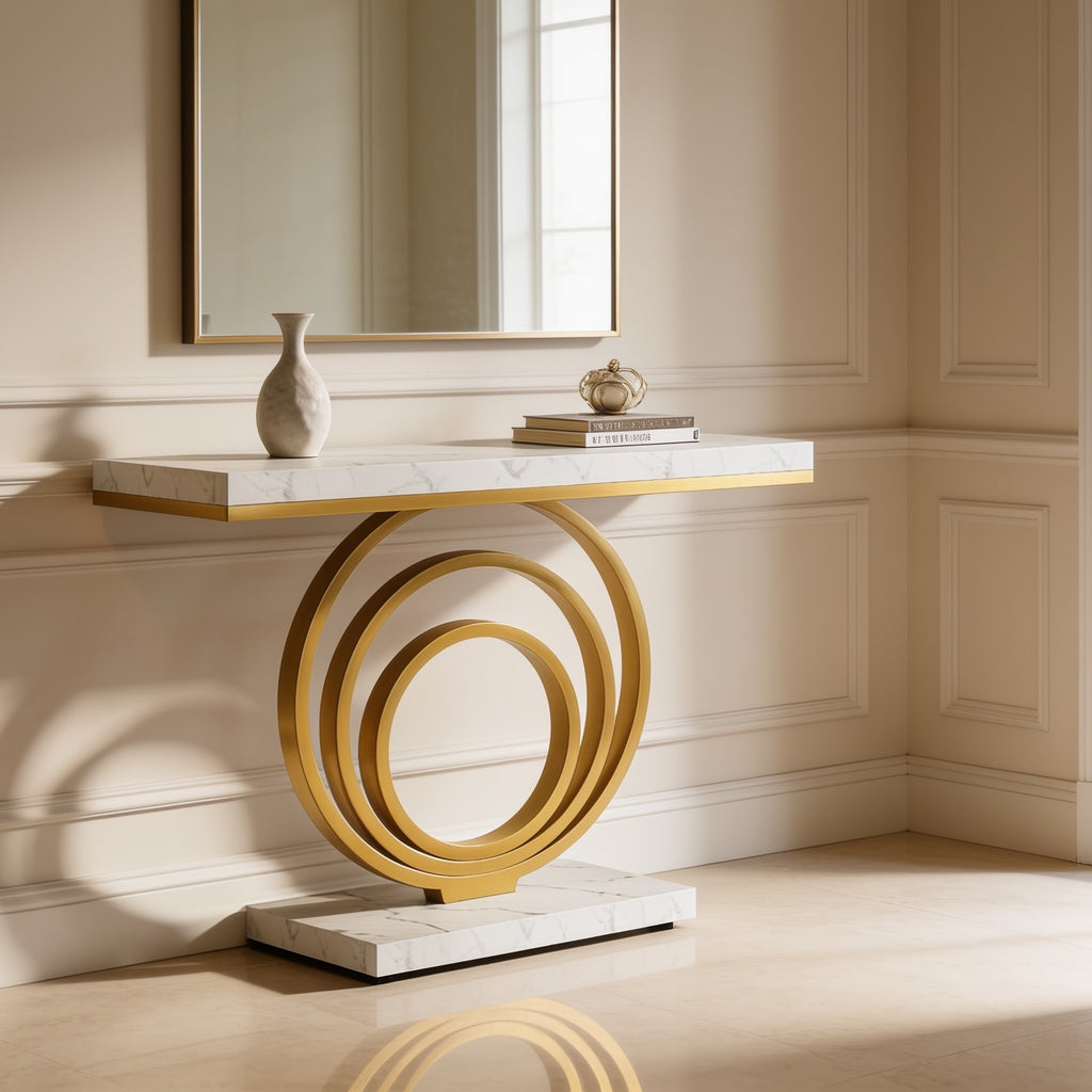 Narrow gold ring console in a sunlit entryway beside a bright window