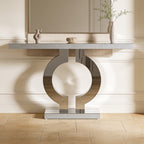 Close view of the polished ring base and stone top with trailing greenery behind