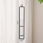 Measurement view of the black framed tube against a sheer curtain