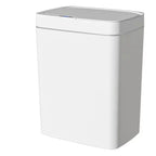 Plain studio view of the closed white sensor trash can on a white background