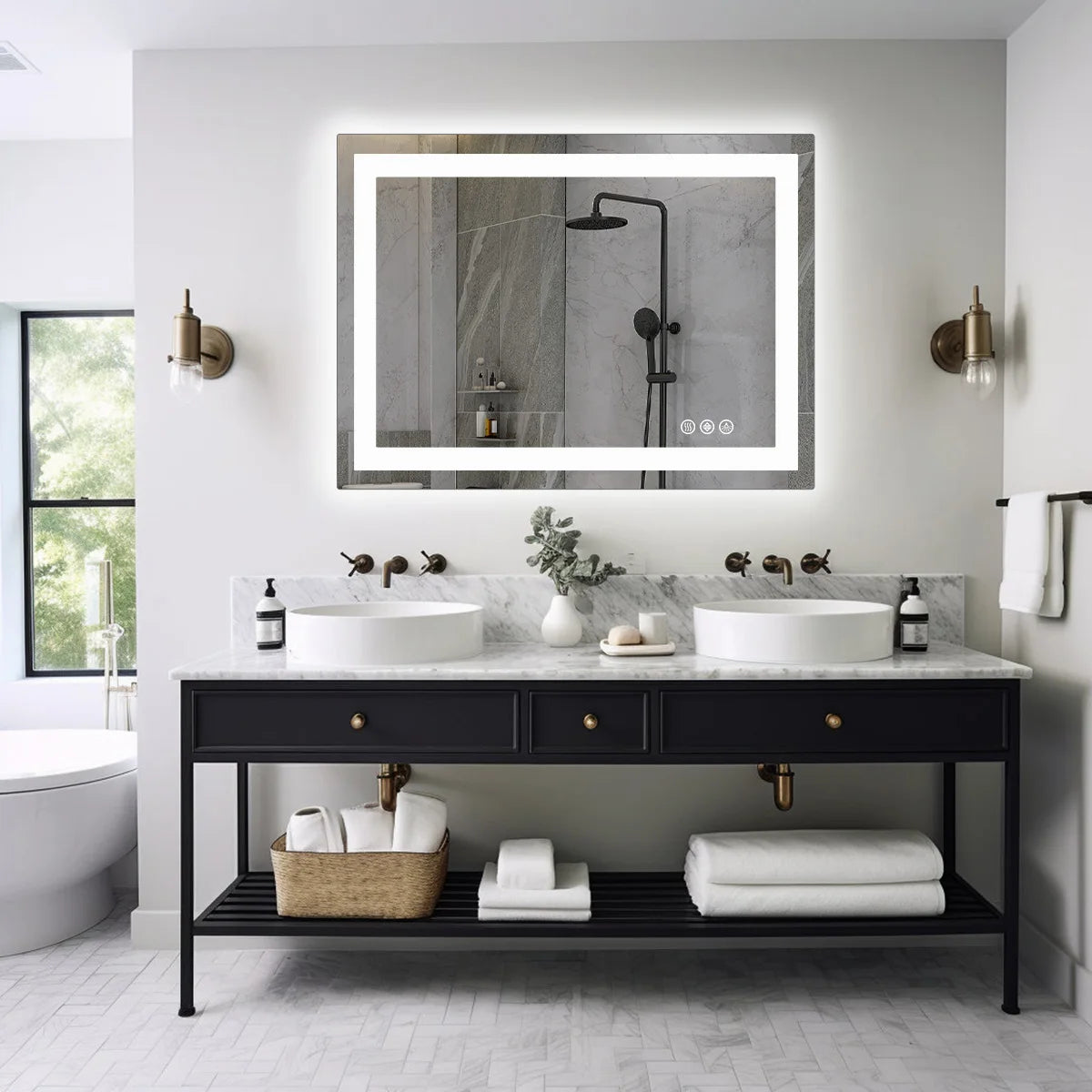 Front lit mirror above a black double vanity holding two white vessel sinks