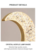 Close view of the faceted crystal acrylic shade curving into the moon shape