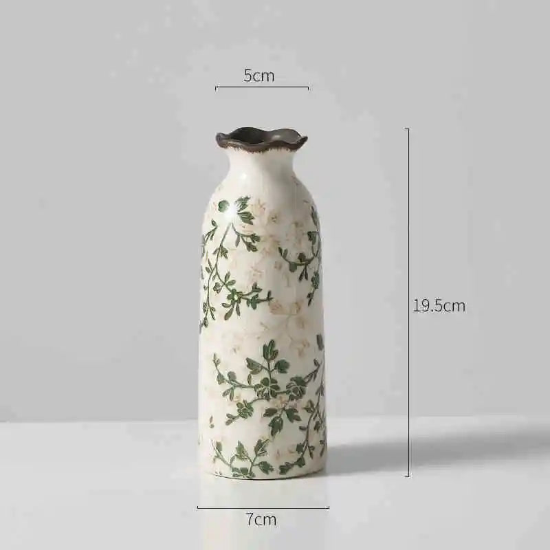 Middle height vine patterned vase on a plain gray background with size labels