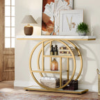 Gold ring frame console holding bottles and glasses along a papered wall