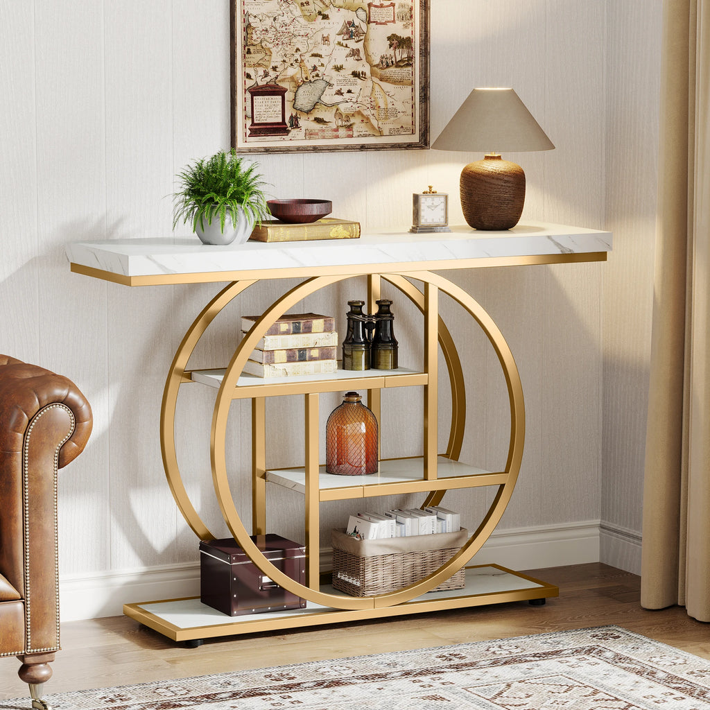 White stone look console top on a gold ring frame with bottles on the shelves