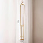 Measurement view of the taller gold framed tube on a pale curtain