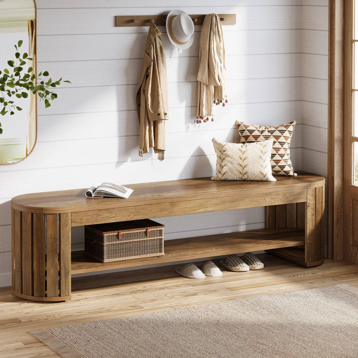 Slatted leg bench against white shiplap with pillows and shoes tucked below