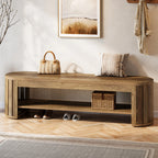 Bench in an entry holding a woven bag and cushion with a basket underneath