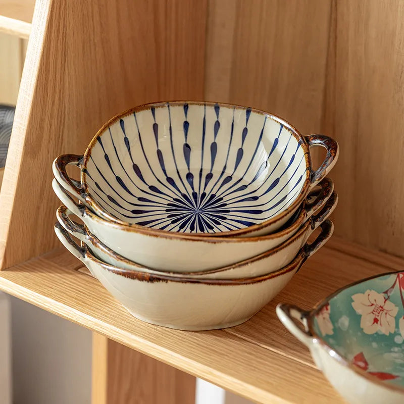 Stack of striped and floral noodle bowls resting on a wooden shelf