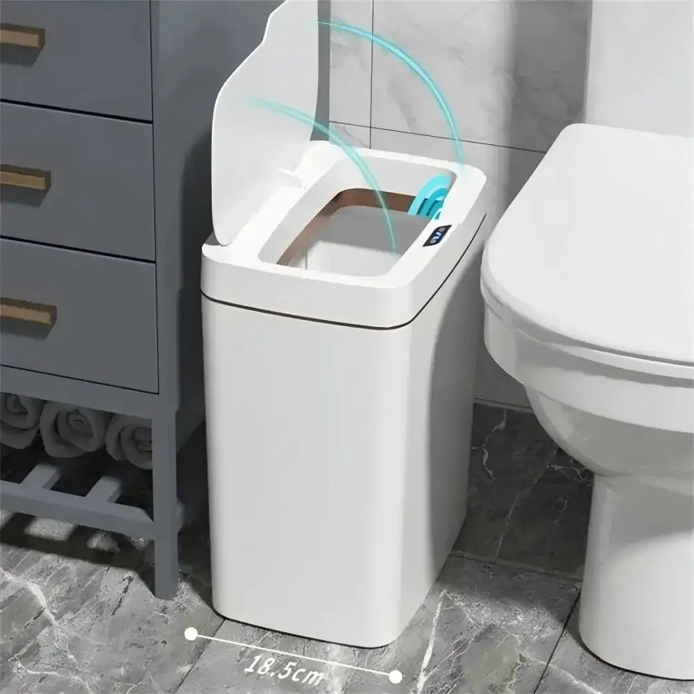 White sensor trash can next to a toilet with an arc showing the lid sensing range