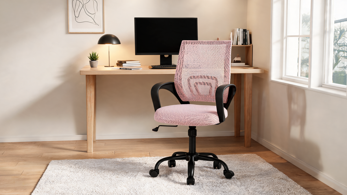 Mesh office chair reclined in its rocking tilt range
