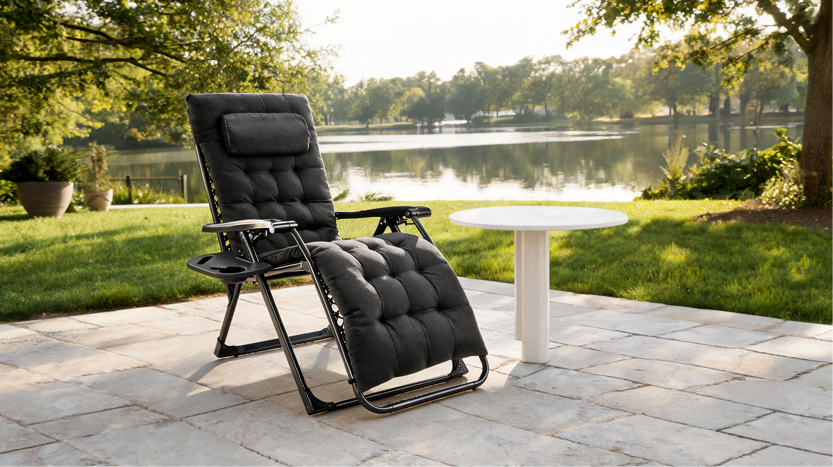 Folding zero gravity recliner opened in seconds beside a poolside deck