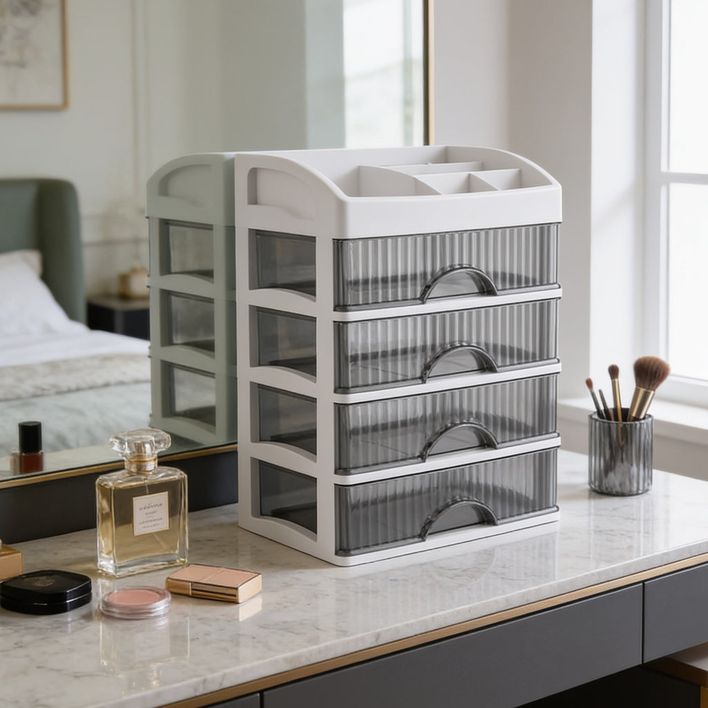 Frosted drawer tower on a marble vanity with perfume bottles and a brush cup nearby