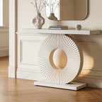 Ivory fluted disc console with a slim white top standing on a wood floor