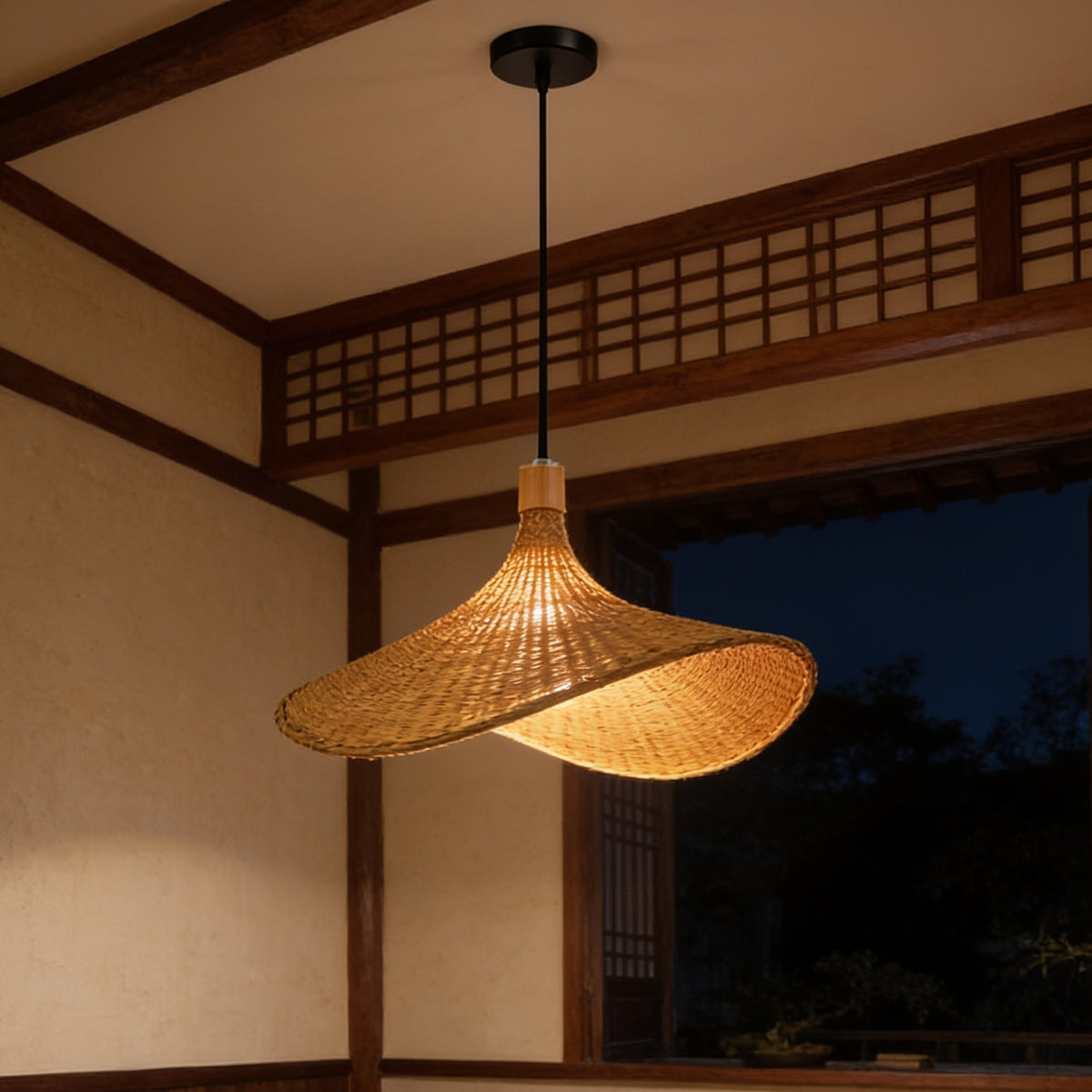 Pair of straw hat shades in a room with lattice panels and a dark window behind