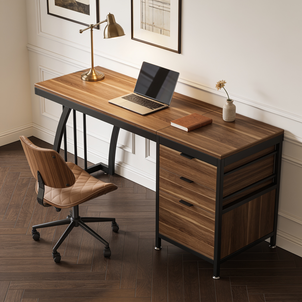 Wood computer desk with framed prints above and a two drawer cabinet beside it