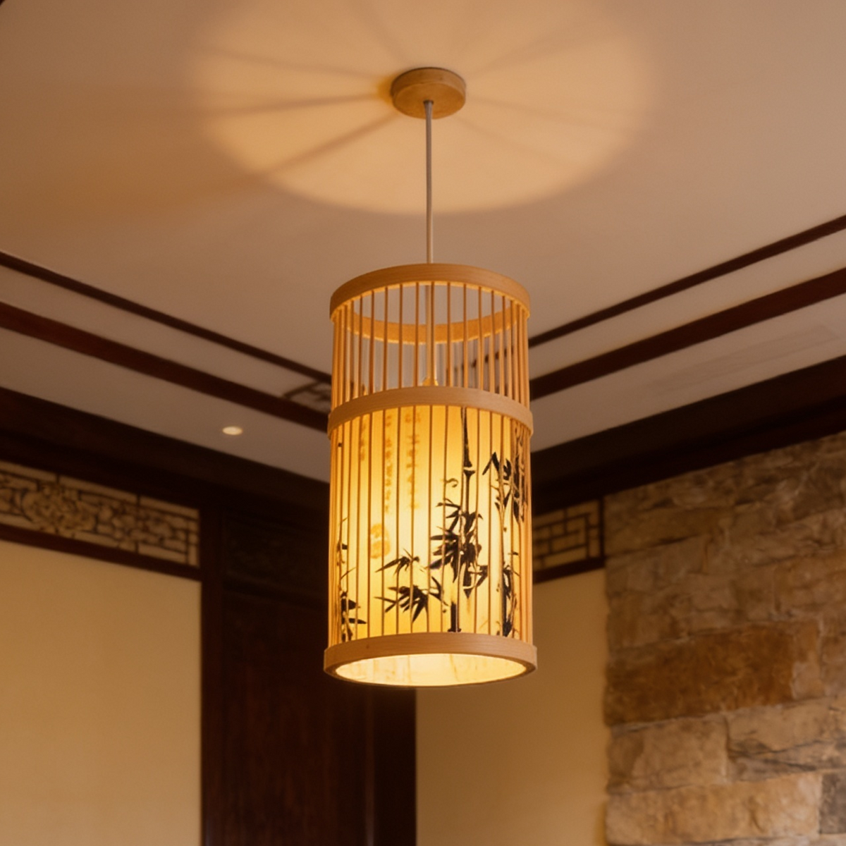 Woven bamboo cage lantern glowing close to a stone wall under a dark wood ceiling