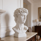 Matte white David bust on a plinth atop a marble console in a paneled room