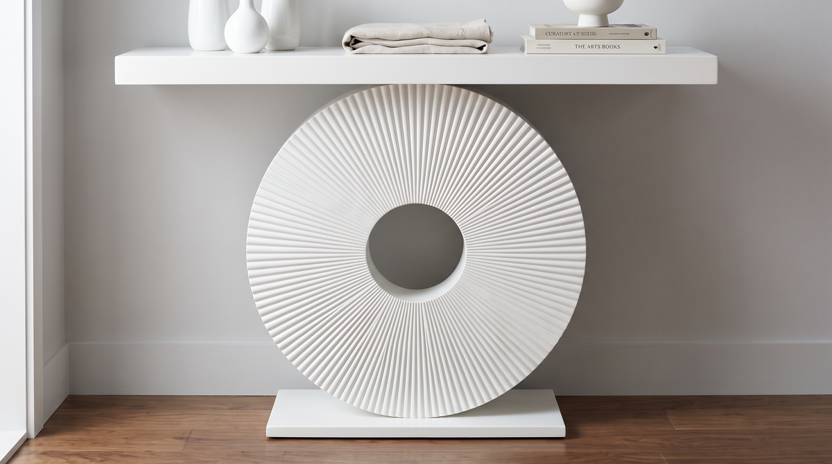 Fluted disc console table seen square on in an entryway