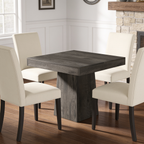 Gray square dining table beside a stone fireplace with pale seats around it