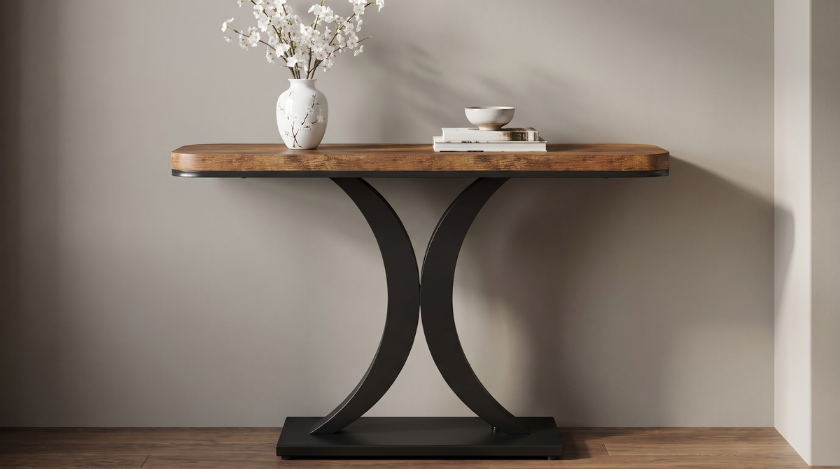 Console table on a black hourglass base seen square on