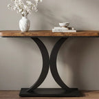 Close view of the console top with a white vase of blossom and stacked bowls