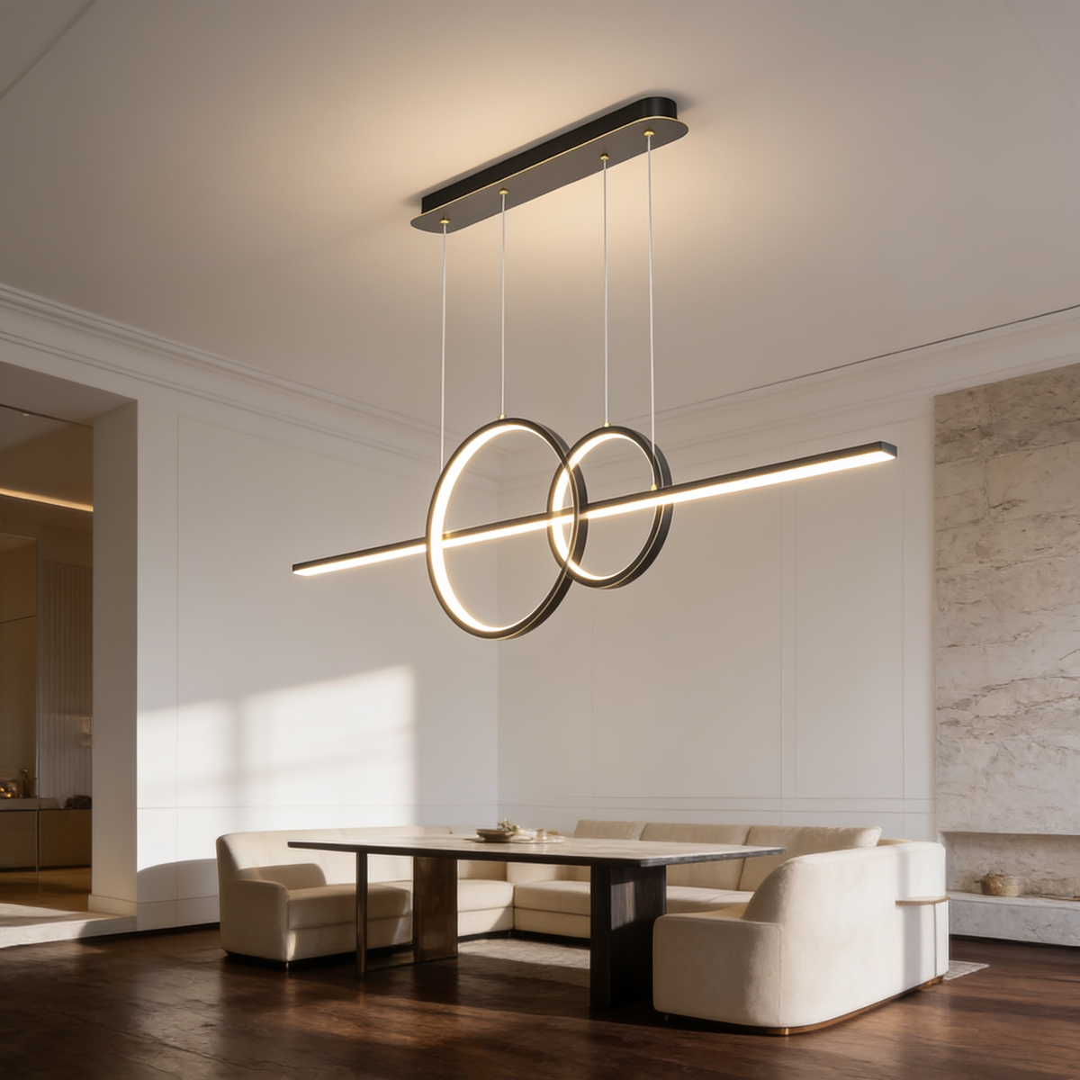 Gold linear bar pendant with two crossing rings above a dining table