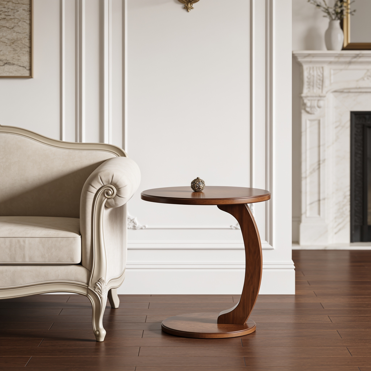 Round side table beside an armchair in a paneled room with a marble fireplace