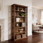 Six tier brown bookcase with trailing plants and books by a white doorway
