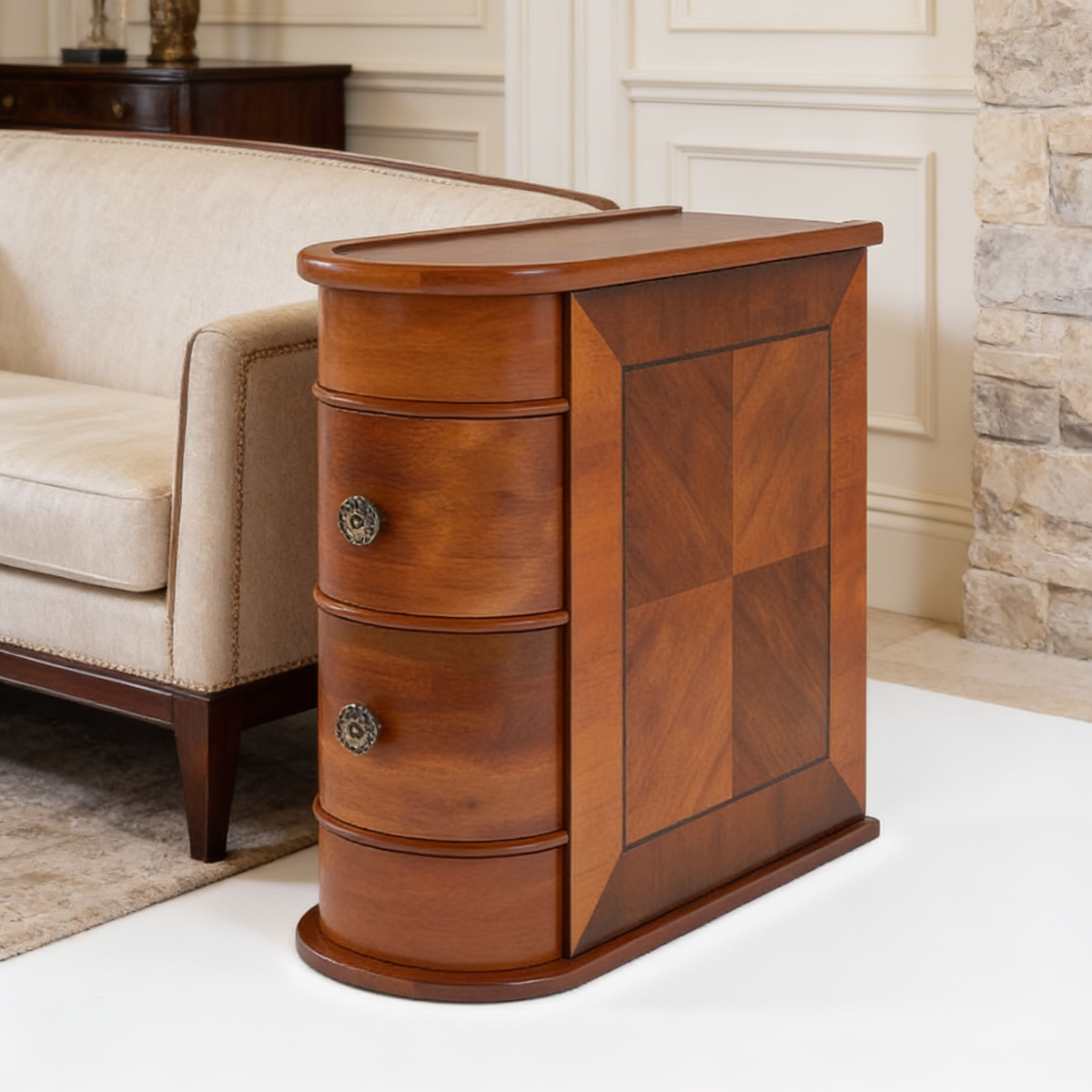 Close angled view of the curved drawer fronts and small round knobs