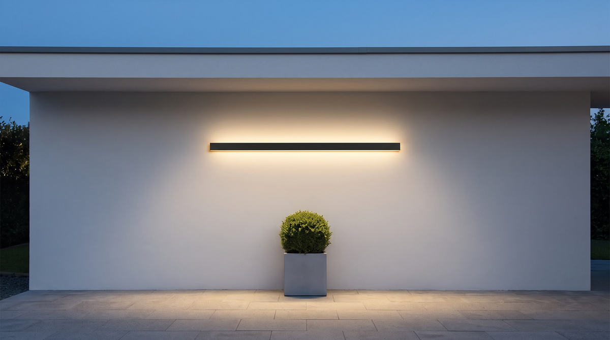 Linear wall light mounted horizontally above a modern porch