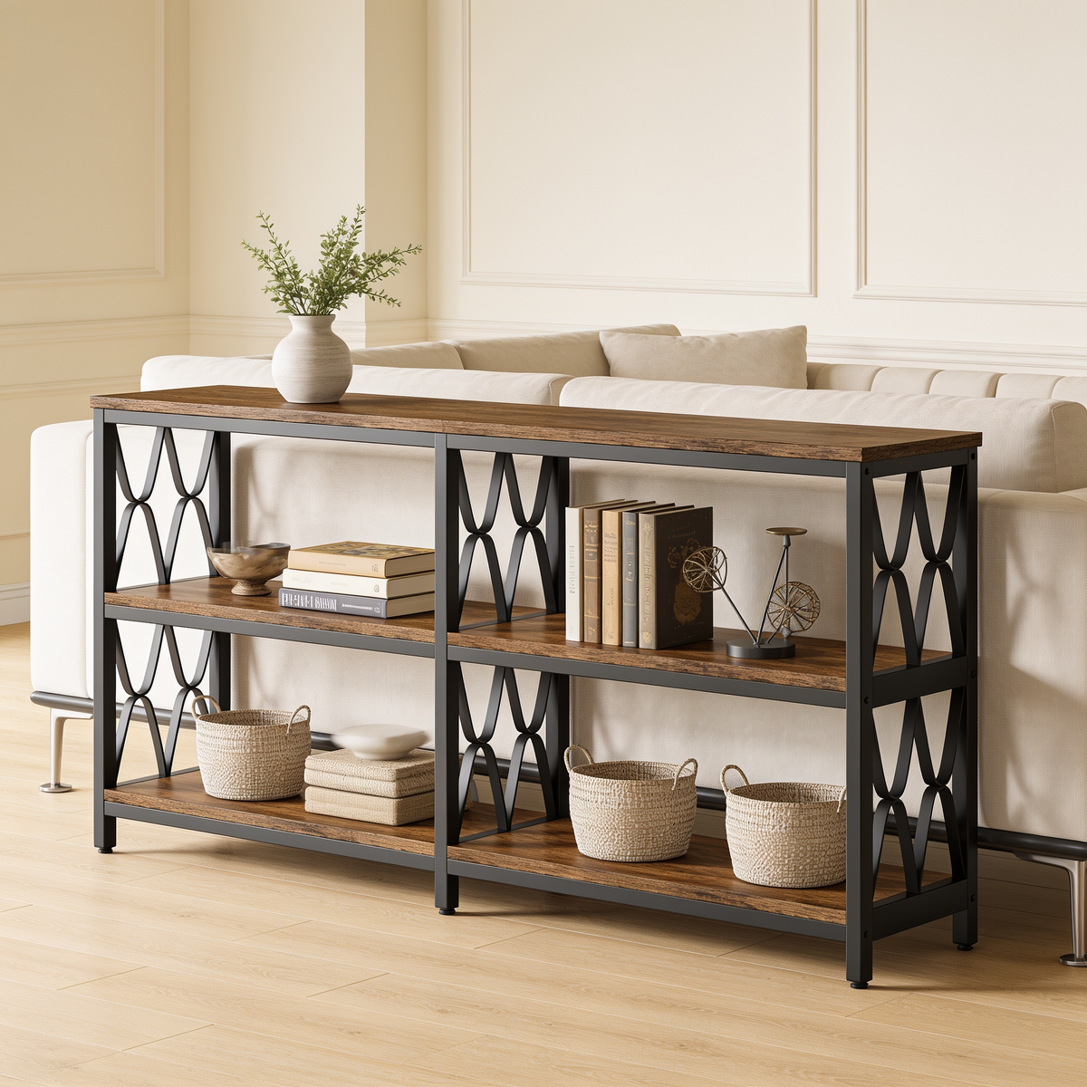 Long console with three wood shelves on a black X braced frame behind a cream sofa