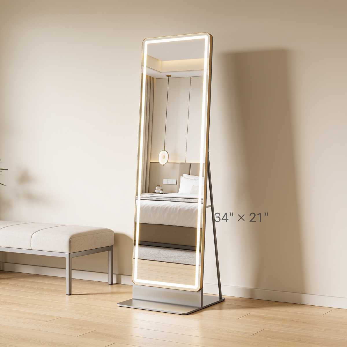 Lighted mirror in a bedroom with its height and width labeled on the glass