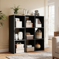 Nine cube storage unit holding woven baskets and fabric bins in a sunlit room