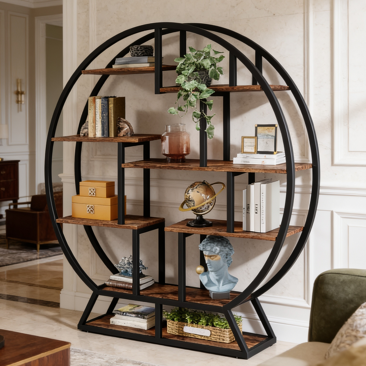 Circle frame etagere front on, filled with books, boxes, a globe and a trailing plant