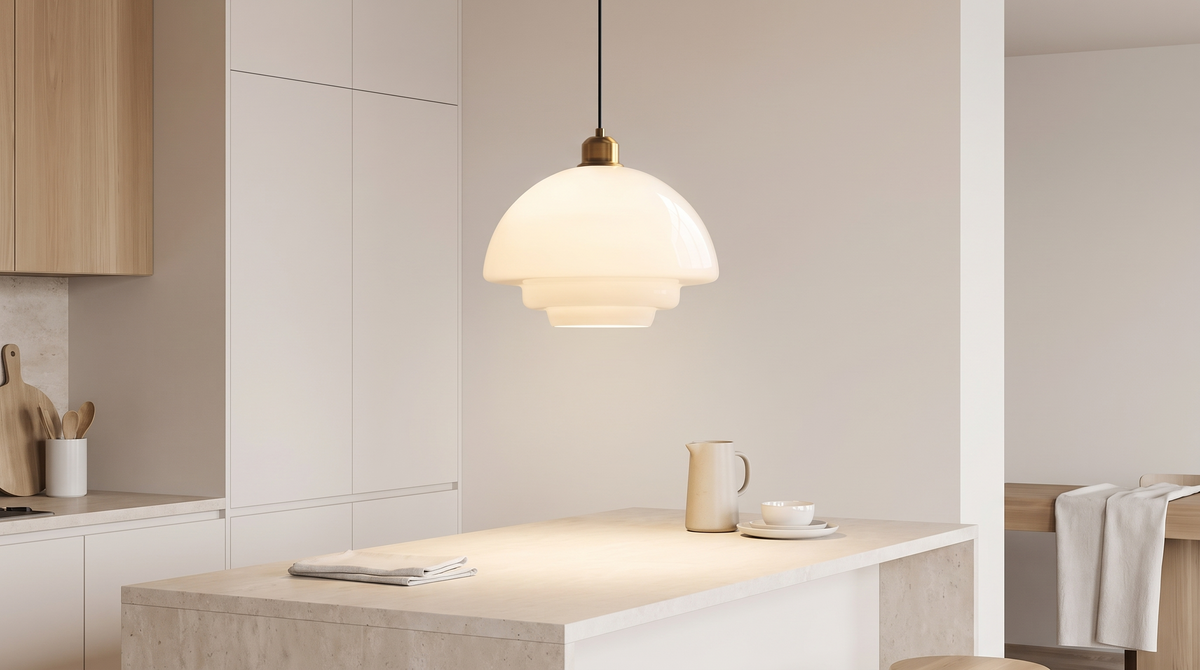 Opal glass pendant above a kitchen island