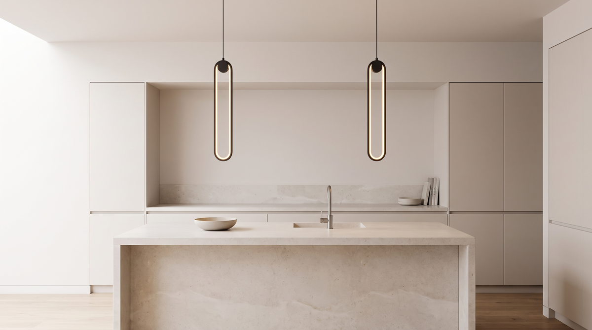 A pair of ring pendants over a kitchen island