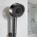 Close view of the spray face and the mode buttons on the black handle