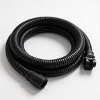 Coiled black shower hose with its brass connector on a white surface