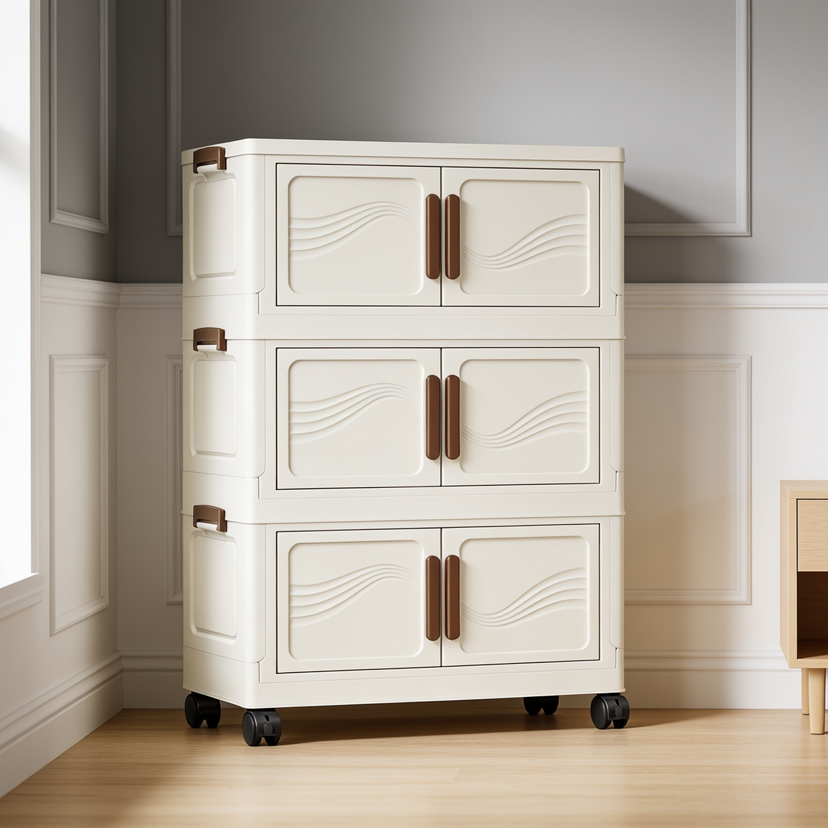 Three tier cabinet with solid cream doors rolled onto a wood floor