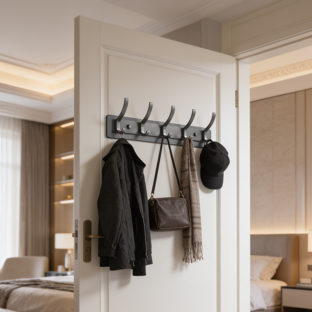 Wall hook strip with a dark jacket brown bag and cap in a hotel style bedroom