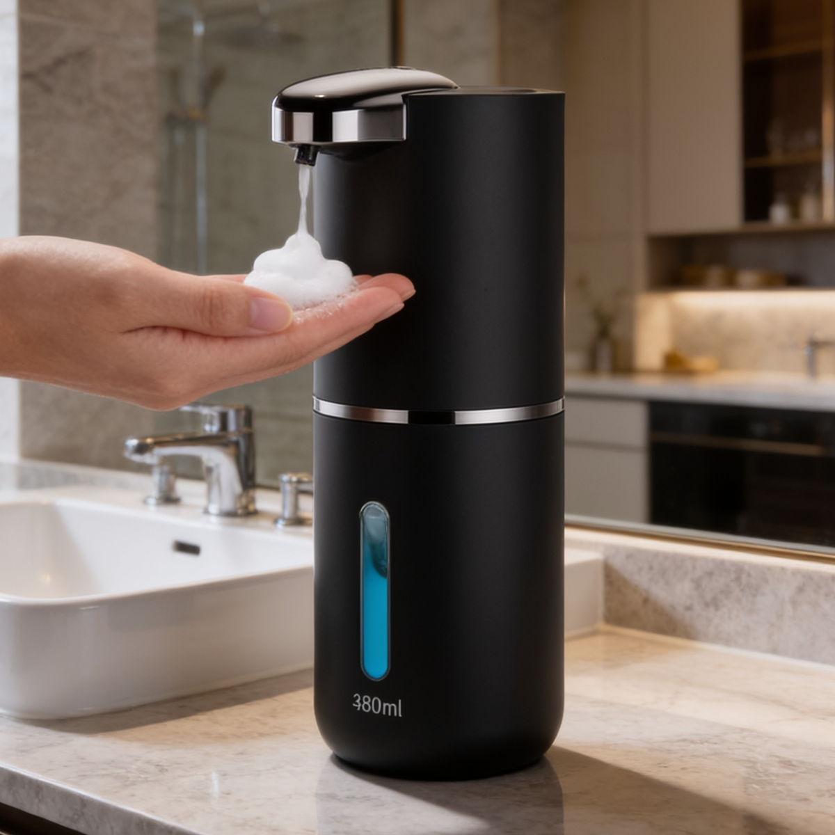 Black touchless soap dispenser releasing foam onto an open hand above a basin
