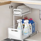 White sliding organizer with cleaning sprays and gloves inside a wood cabinet