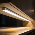 Close view of the aluminum light bar mounted to the underside of a cabinet