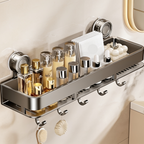Close view of the wall shelf loaded with toiletries and brushes hanging from its hooks