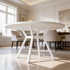 Overhead angle of a white round dining table and beige chairs in a long dining room