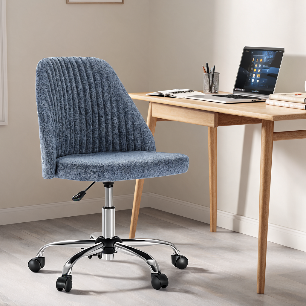 Blue ribbed swivel chair at a wooden desk with a tablet and open notebooks