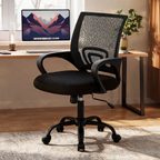 Black mesh back office chair with loop arms in front of a desk and monitor