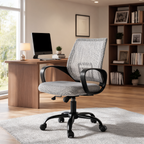 Gray mesh back office chair angled beside a wood desk and a bookcase